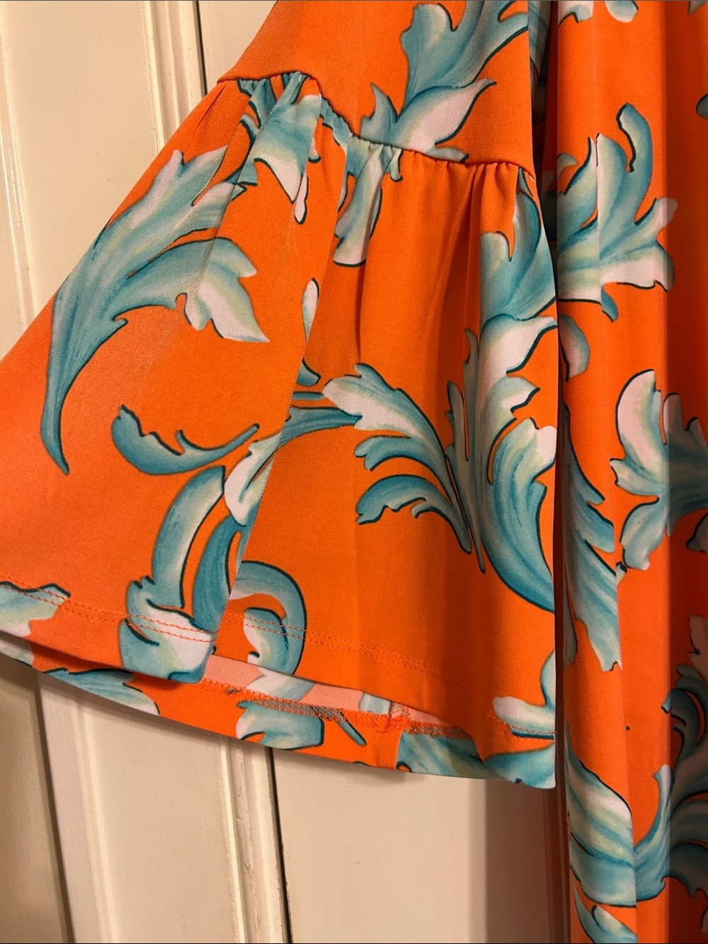 Susan Graver Liquid Knit Orange Tunic with Aqua Scroll Print - Picture 4 of 5